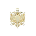 Gold double-headed eagle pendant on a white background